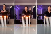 華麗なヌンチャクさばきを見せる女性が6本のロウソクの火を消すパフォーマンスに挑戦！成功したと思いきや…