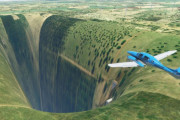 飛行ゲーム『MSフライトシミュレーター』で地面に巨大な深淵の穴が開くバグ、中には空港が出現